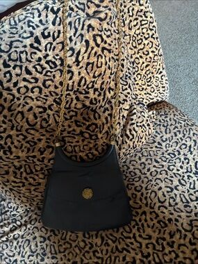 Vintage Black Shoulder Bag with Gold Chain and Medallion Detail